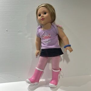 Madame Alexander doll size 18”, blonde hair, blue eyes, wearing denim skirt,